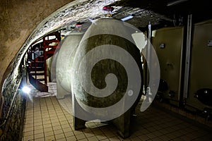 Concrete tanks eggs. Visit of undergrounds caves, traditional producing of champagne wine in Cote des Bar, Aube, south of