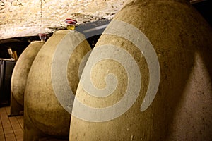 Concrete tanks eggs. Visit of undergrounds caves, traditional producing of champagne wine in Cote des Bar, Aube, south of