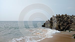 Concrete tetrapods, Pozhikkara beach, Kollam district, Kerala, seascape view photo
