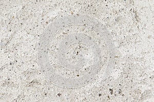 Concrete texture with splashes close-up.