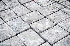 Concrete tile texture. City pavement background.