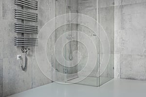 Concrete tiles in modern, spacious bathroom