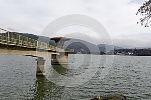 Concrete tower - equipment of picturesque dam, gather water of Iskar river