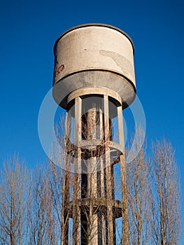 Concrete tower with water cistern.