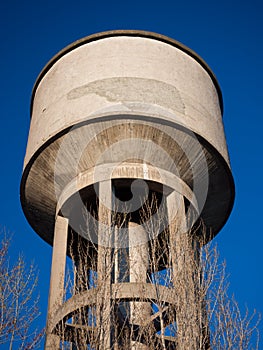 Concrete tower with water cistern.