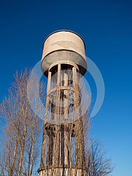 Concrete tower with water cistern.