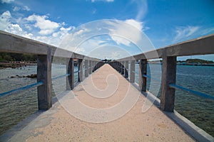 Concrete walkway to seaport