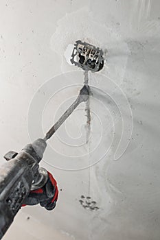 Concrete wall cutting and concealed wiring during electrical work