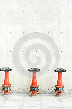 Concrete wall and floor with fire hydrant,industrial background