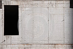 Concrete Wall Frame of Building under Construction with Formwork Prints Smudges on Surface. Architectural origin of