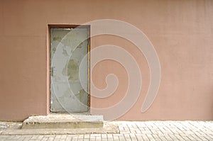 Concrete Wall with Old Door