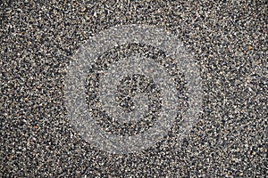 Concrete wall with small stones texture