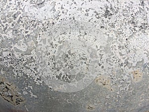 Concrete wall surface that has long been used as a tracer.