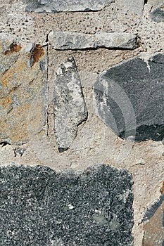 Concrete wall texture background. Natural stones. Building`s facade decor. Decorative plaster. House exterior.