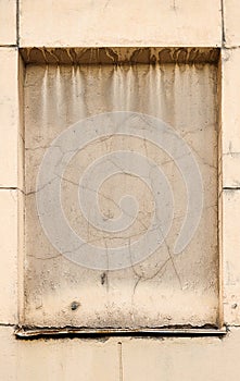 Concreted window of an old house photo