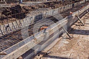 Concreting the base of the building. Construction worker Concrete pouring during commercial concreting floors of building in