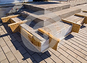 Concreting steps at the entrance to the building using homemade formwork