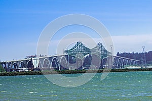 The Conde B. McCullough Memorial Bridge, formerly the Coos Bay Bridge, is a cantilever bridge that spans Coos Bay on U.S. Route