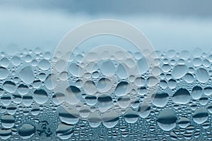 Condensation abstract water drops on the window glass