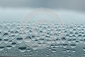 Condensation abstract water drops on the window glass