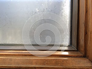 Condensation on wood window frame