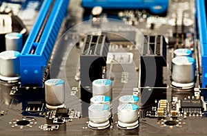 Condensators on laptop motherboard close view