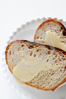 Condense milk and french bread on plate