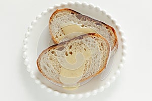 Condense milk and french bread on plate