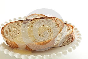 Condense milk and french bread on plate