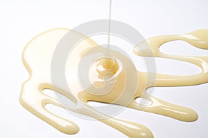 Condensed milk isolated on a white background