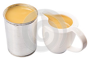 Condensed Milk In Tin Can And Milk Container I