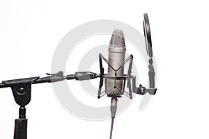 Condenser Mic On Stand In Studio Isolated On White