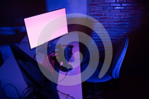 Condenser microphone on the table work and computer monitor equipment for the virtual meeting streaming online