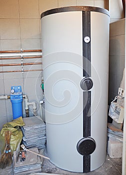 Condensing boiler, combi boiler hot water tank for house heating in boiler room