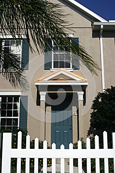 Condo with picket fence photo