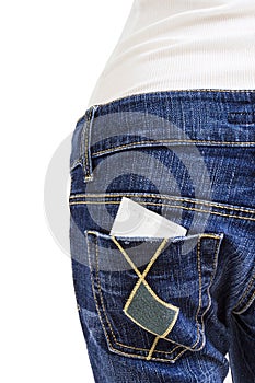 Condom in the back pocket of blue jeans