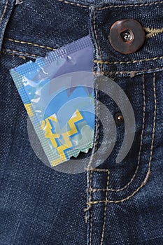 Condom in the blue jeans