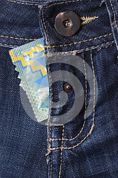 Condom in the blue jeans