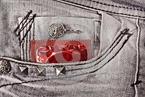 Condom in the grey jeans