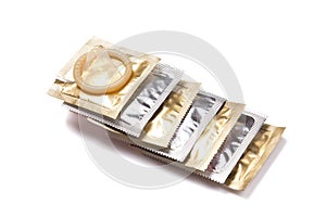 Condom packs on a white background