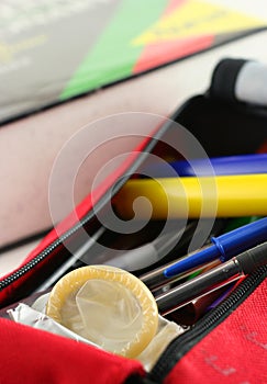 Condom in pen-case