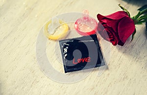 Condom Prevent Pregnancy Contraception Valentines safe sex concept pregnancy or sexually transmitted disease