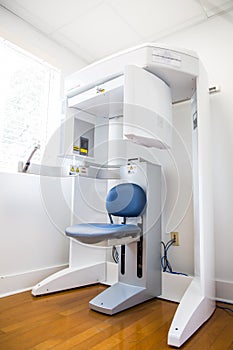 Cone Beam CT Scanner machine CBCT 3D xray for face maxilla jaw mandible radiograph three dimensional photo