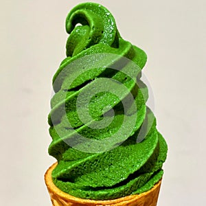 A cone of matcha ice cream