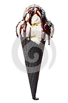 cone, wafer cup with scoops of ice cream poured chocolate glaze and decorated multicolor sprinkles is isolated on white