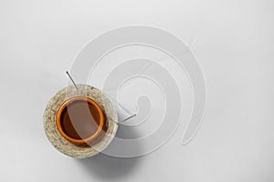 A cone of white yarn on an isolated background viewed from the top