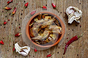 Conejo al ajillo, a typical spanish recipe of rabbit photo