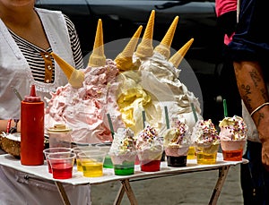 Cones and ice cream with syrup