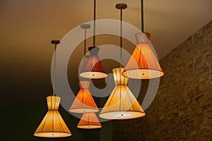 cones shaped vintage retro style electrical ceiling lights at night