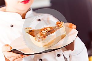 Confectioner Baking A Cake